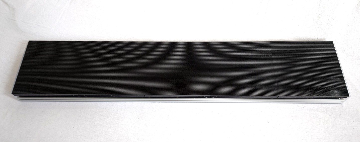 A rectangular LED panel from the side showing the 2020 extruded aluminium frame on a white background