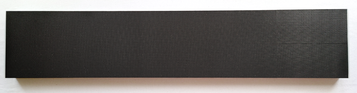 A rectangular LED panel from above on a white background