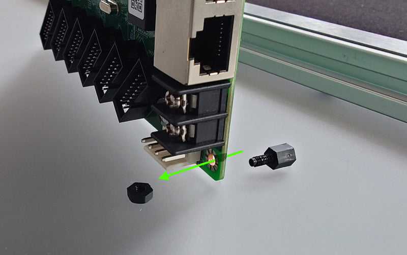 The stand off is inserted from the underside of the receiving card