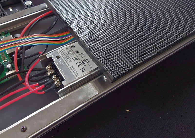 The first LED module seated in the frame