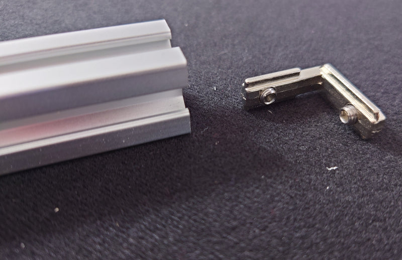 Align the L-bracket with the track
