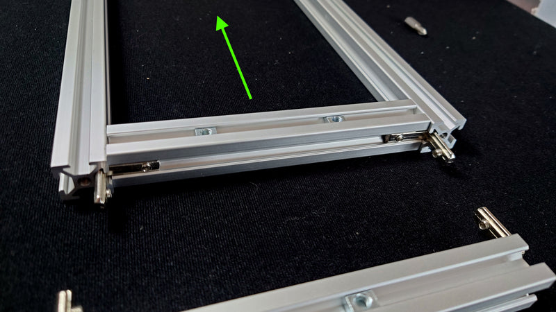 Slide cross bars onto side bars as shown