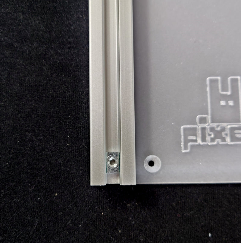 T-nut aligned with the corresponding hole on the back plate