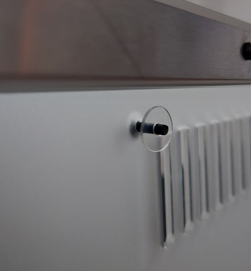 Putting the washers on helps keep the screws in the holes when turning the panel back over