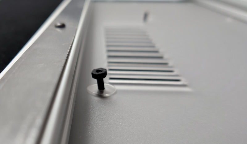Putting a nylon nut very loosely onto the screw nearest the frame side makes the next step a lot easier