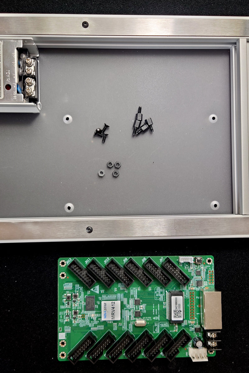 Attach stand offs through the holes shown.
