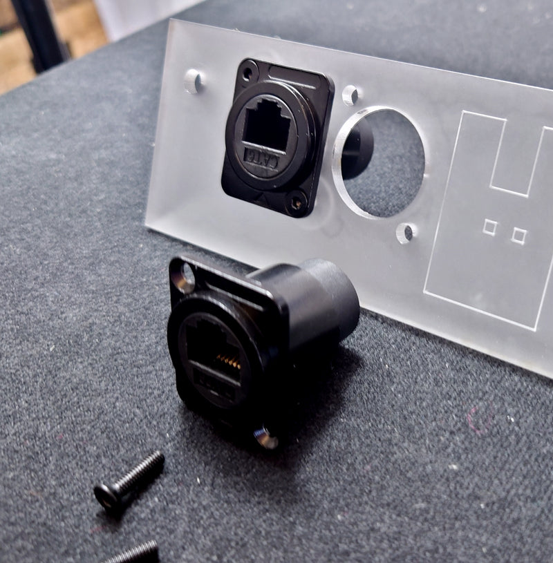 Attaching RJ45 ports to base plate