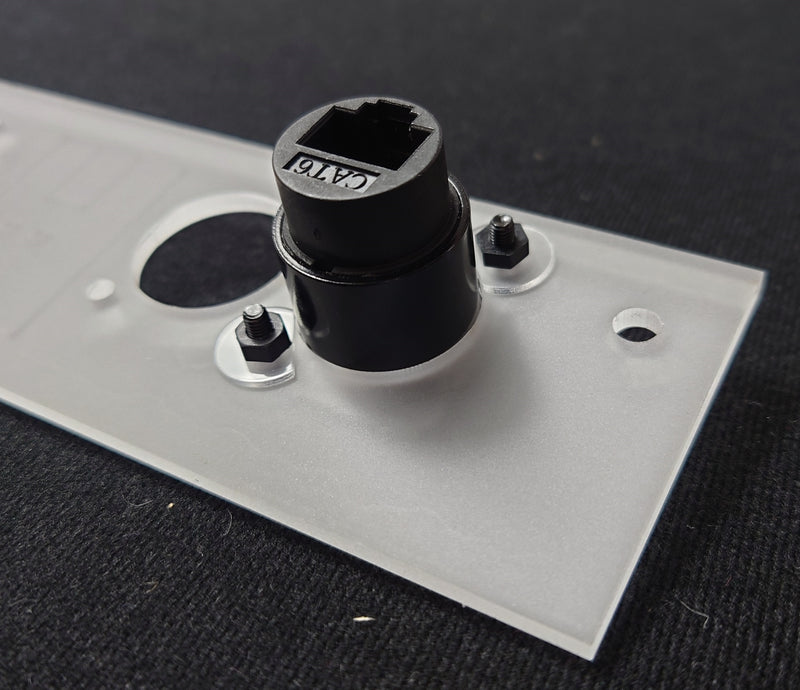 Back of RJ45 port attached to base plate