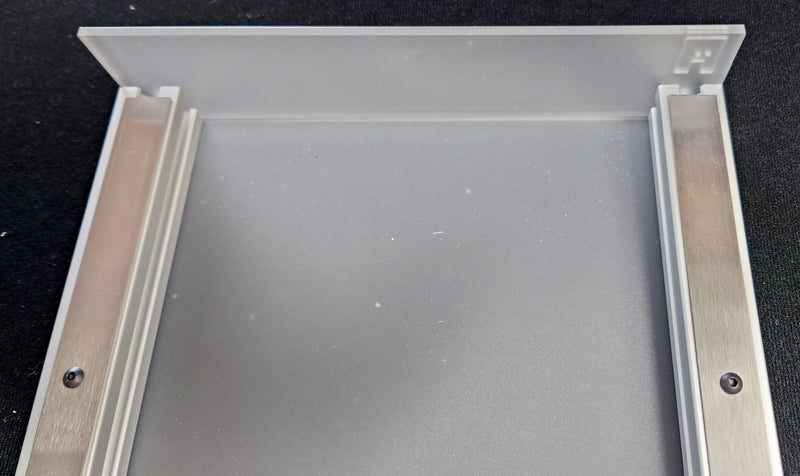 Top  late secured to frame