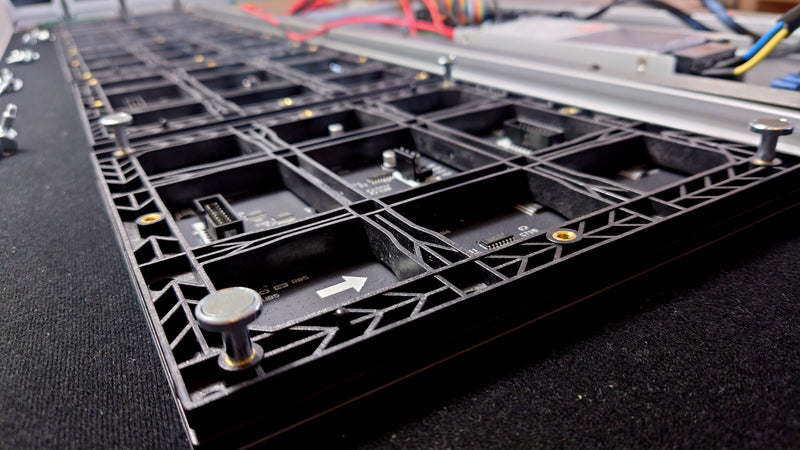 Screw the feet into the LED modules securely