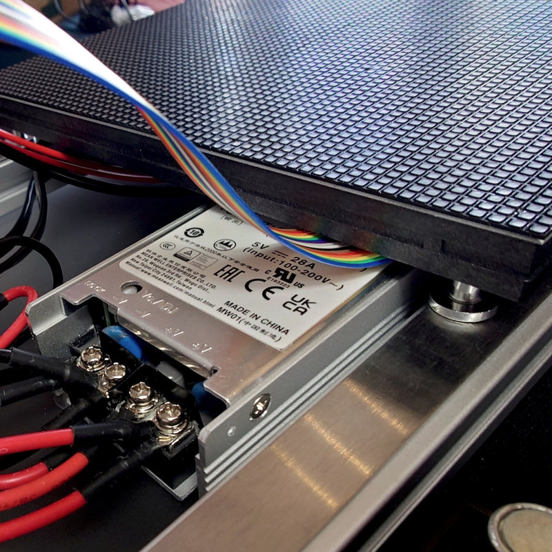 The first LED module seated in the frame