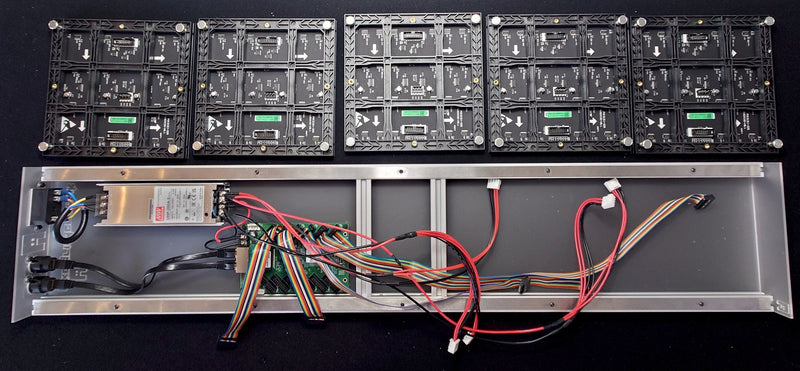 LED modules aligned correctly next to the frame. Note the arrow directions.